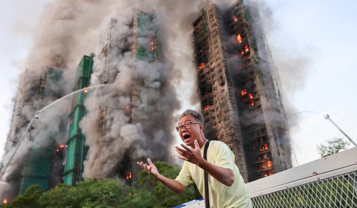 Hong kong daki bir yanginin bu fotografi dunyayi dolasti adamin kim oldugu biliniyor 26073