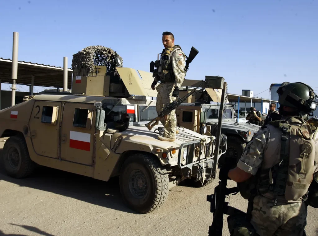 polonya irak taki askerlerini tahliye etti artan bolgesel gerilimler karari tetikledi 53992